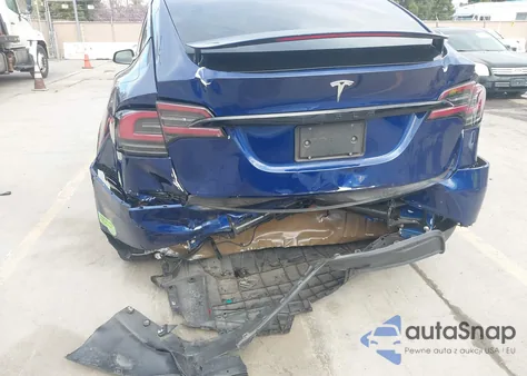 2023 Tesla Model X Dual Motor All-Wheel Drive/Standard Range z USA, uszkodzony, nr VIN 7SAXCAE5XPF377952